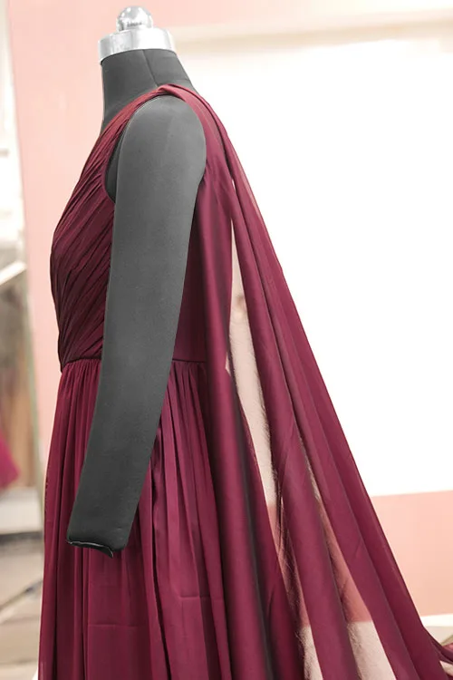 The Ethereal One-Shoulder from the side, showing the drape that falls from the shoulder the length of the gown